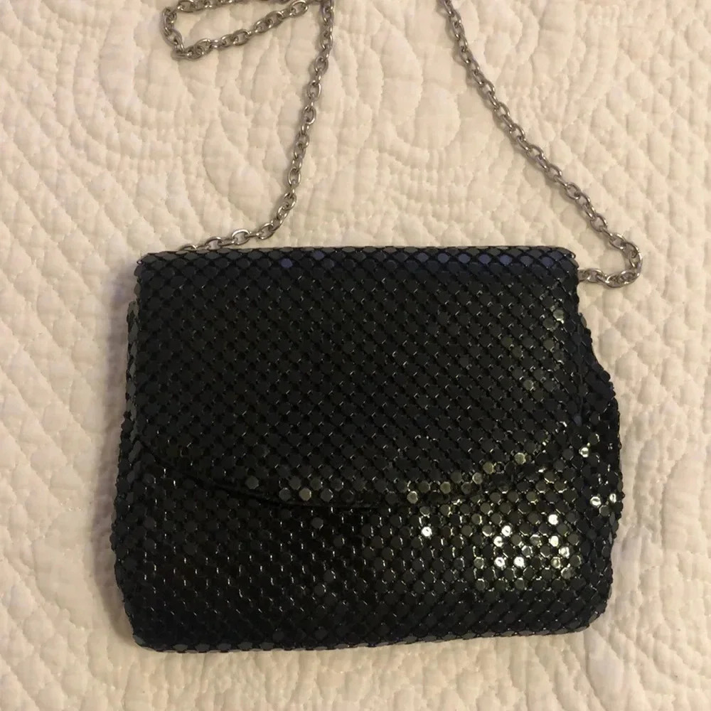 Touch of Nina black metal mesh bag with silver strap.